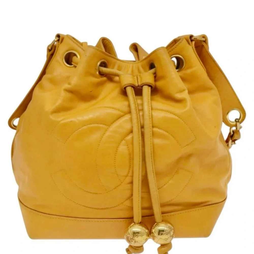 Authentic CHANEL yellow lambskin bucket bag with wallet pouch